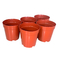 Rote runde Plastikblumen-Topf-Kindertagesstätten-Töpfe für im Garten arbeiten ein Topf